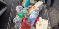 Brittany Zwier and Frank Martinez's grocery cart at Aldi, which does not provide traditional shopping bags.