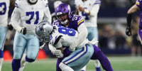 ARLINGTON, TEXAS - DECEMBER 14: Ceedee Lamb #88 of the Dallas Cowboys is tackled after his reception by Eric Wilson #55 of the Minnesota Vikings during the first quarter at AT&T Stadium on December 14, 2025 in Arlington, Texas. (Photo by Stacy Revere/Getty Images)