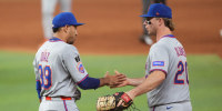 Sep 27, 2025; Miami, Florida, USA; New York Mets first baseman Pete Alonso (20) congratulates pitcher Edwin Díaz (39) following a victory over the Miami Marlins at loanDepot Park. Mandatory Credit: Jim Rassol-Imagn Images