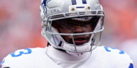 Oct 26, 2025; Denver, Colorado, USA; Dallas Cowboys running back Javonte Williams (33) looks on before the game against the Denver Broncos at Empower Field at Mile High. Mandatory Credit: Ron Chenoy-Imagn Images