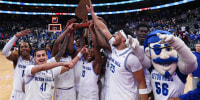 Dec 13, 2025; Newark, New Jersey, USA; Seton Hall Pirates celebrate with the Garden State Hardwood Classic trophy after their game against the Rutgers Scarlet Knights at Prudential Center. Mandatory Credit: Vincent Carchietta-Imagn Images