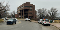 Police outside City Hall in Lawrence, Kan., on Jan. 5, 2026.