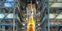 All work platforms are retracted from around NASA’s Artemis II SLS (Space Launch System) rocket and Orion spacecraft, secured to the mobile launcher, inside the Vehicle Assembly Building on Friday, Jan. 16, 2026, in preparation for rollout to Launch Complex 39B at NASA’s Kennedy Space Center in Florida.