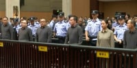 China executes 11 members of Myanmar-based syndicate in crackdown on scam operations.
