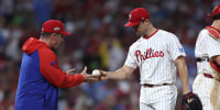Oct 4, 2025; Philadelphia, Pennsylvania, USA; Philadelphia Phillies manager Rob Thomson (49) relieves pitcher David Robertson (30) in the seventh inning against the Los Angeles Dodgers during game one of the NLDS round for the 2025 MLB playoffs at Citizens Bank Park. Mandatory Credit: Bill Streicher-Imagn Images