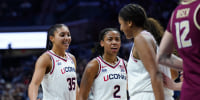 Nov 9, 2025; Storrs, Connecticut, USA; UConn Huskies guard Azzi Fudd (35) and guard Kk Arnold (2) react with forward Sarah Strong (21) after a play against the Florida State Seminoles in the first half at Harry A. Gampel Pavilion. Mandatory Credit: David Butler II-Imagn Images