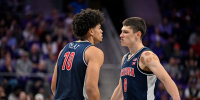Jan 10, 2026; Fort Worth, Texas, USA; Arizona Wildcats forward Koa Peat (10) and forward Ivan Kharchenkov (8) celebrate during the game between the Horned Frogs and the Wildcats at Ed and Rae Schollmaier Arena. Mandatory Credit: Jerome Miron-Imagn Images
