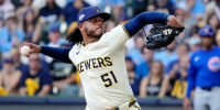 Oct 4, 2025; Milwaukee, Wisconsin, USA; Milwaukee Brewers starting pitcher Freddy Peralta (51) pitches against the Chicago Cubs during the second inning of game one of the NLDS round for the 2025 MLB playoffs at American Family Field. Mandatory Credit: Michael McLoone-Imagn Images