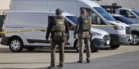 Members of the FBI Evidence Response Team outside the Fulton County Election Hub and Operation Center after the FBI executed a search warrant there in relation to the 2020 election, in Union City, Georgia on Jan. 28, 2026. 