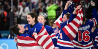 Team USA celebrates on the ice