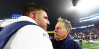 FOXBOROUGH, MASSACHUSETTS - JANUARY 04: Head coach Mike Vrabel of the Tennessee Titans is congratulated by head coach Bill Belichick of the New England Patriots after their 20-13 win in the AFC Wild Card Playoff game at Gillette Stadium on January 04, 2020 in Foxborough, Massachusetts. (Photo by Adam Glanzman/Getty Images)
