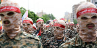 Islamic Revolutionary Guard Corps (IRGC) members march