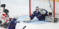 U.S. goalkeeper Jen Lee makes a save during gold medal game against Canada at the Beijing 2022 Paralympic Winter Games.