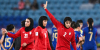 Atefeh Imani waves on the soccer field