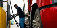 A customer fills their semi-truck at a Pilot Traveler Center on March 09, 2026 in Lockhart, Texas. 