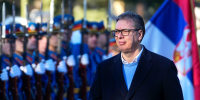 Serbia's President Aleksandar Vucic reviews the honor guard during a welcoming ceremony at the army barracks in Belgrade, Serbia, Tuesday, Jan. 30, 2024. 