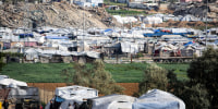 Tents sheltering Palestinians displaced by conflict are pictured in Nuseirat in the central Gaza Strip on March 11.
