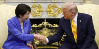 Japanese Prime Minister Sanae Takaichi shakes hands with President Donald Trump in the Oval Office
