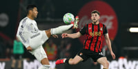 Manchester United's Brazilian midfielder #18 Casemiro (L) fights for the ball with Bournemouth's Scottish midfielder #10 Ryan Christie (R) during the English Premier League football match between Bournemouth and Manchester United at the Vitality Stadium in Bournemouth, southern England on March 20, 2026. (Photo by Glyn KIRK / AFP via Getty Images) / RESTRICTED TO EDITORIAL USE. No use with unauthorized audio, video, data, fixture lists, club/league logos or 'live' services. Online in-match use limited to 120 images. An additional 40 images may be used in extra time. No video emulation. Social media in-match use limited to 120 images. An additional 40 images may be used in extra time. No use in betting publications, games or single club/league/player publications. /