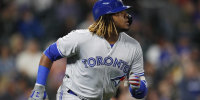 Toronto Blue Jays' Vladimir Guerrero Jr. heads up the first base line after hitting a solo home run off Colorado Rockies relief pitcher Chris Rusin during the eighth inning of a baseball game Friday, May 31, 2019, in Denver. (AP Photo/David Zalubowski)