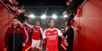 LONDON, ENGLAND - MARCH 01: William Saliba and Jurrien Timber of Arsenal celebrate as they walk down the tunnel after the team's victory in the Premier League match between Arsenal and Chelsea at Emirates Stadium on March 01, 2026 in London, England. (Photo by Stuart MacFarlane/Arsenal FC via Getty Images)