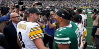 EAST RUTHERFORD, NEW JERSEY - SEPTEMBER 07: Aaron Rodgers #8 of the Pittsburgh Steelers and Justin Fields #7 of the New York Jets shake hands following the NFL 2025 game between Pittsburgh Steelers and New York Jets at MetLife Stadium on September 07, 2025 in East Rutherford, New Jersey. (Photo by Evan Bernstein/Getty Images)