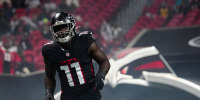 ATLANTA, GEORGIA - DECEMBER 07: Jalon Walker #11 of the Atlanta Falcons runs out of the tunnel prior to an NFL football game against the Seattle Seahawks at Mercedes-Benz Stadium on December 7, 2025 in Atlanta, Georgia. (Photo by Perry Knotts/Getty Images)