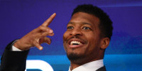 NEW YORK, NEW YORK - FEBRUARY 27: New York Giants quarterback Jameis Winston takes photos on the floor of the New York Stock Exchange during morning trading on February 27, 2026 in New York City. All three major indexes tumbled at opening with the Dow Jones leading the way losing over 700 points after the release of inflation numbers. (Photo by Michael M. Santiago/Getty Images)