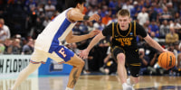 Mar 22, 2026; Tampa, FL, USA; Iowa Hawkeyes guard Bennett Stirtz (14) dribbles the ball against Florida Gators guard Xaivian Lee (1) in the second half during a second round game of the men's 2026 NCAA Tournament at Benchmark International Arena. Mandatory Credit: Nathan Ray Seebeck-Imagn Images