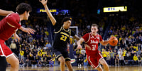 Jan 27, 2026; Ann Arbor, Michigan, USA; Nebraska Cornhuskers guard Cale Jacobsen (31) dribbles defended by Michigan Wolverines forward Yaxel Lendeborg (23) in the second half at Crisler Center. Mandatory Credit: Rick Osentoski-Imagn Images