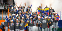 Mar 17, 2026; Miami, FL, United States; Venezuela reacts on the stage after defeating the United States during the 2026 World Baseball Classic Championship game at loanDepot Park. Mandatory Credit: Sam Navarro-Imagn Images