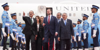 U.S. Vice President JD Vance walks with Pakistani officials after arriving for talks with Iranian officials in Islamabad.