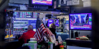 Traders On The Floor Of The New York Stock Exchange As President Trump Holds New Conference