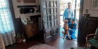 NASA astronaut Christina Koch reunites with her dog, Sadie.
