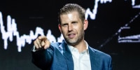 Eric Trump points while speaking