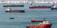 Oil tank farm and ships off the coast of Singapore