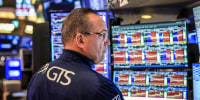 Image: A trader works on the floor of the New York Stock Exchange (NYSE) 