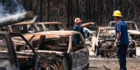 Men in wildfire zone.