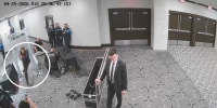 A still image taken from surveillance video released by the Department of Justice shows WHCD shooting suspect Cole Allen rushing past a security checkpoint at the Washington Hilton Hotel on April 25, 2026.