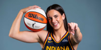 Indiana Fever guard Caitlin Clark (22) poses for a photo Wednesday, April 22, 2026, during media day at Gainbridge Fieldhouse in Indianapolis.