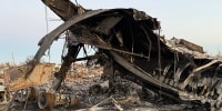 Remains from the UPS cargo plane crash affecting one of the surrounding businesses, Grade A Auto Parts, in Louisville, Ky.
