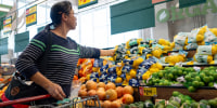  A customer shops for produce at an H-E-B grocery store on May 11, 2026 in Austin, Texas. 