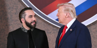 Nayib Bukele, left, and Donald Trump stand next to each other