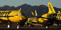Spirit Airlines Planes Sit Parked  At Phoenix Goodyear Airport After Airline Shuts Down