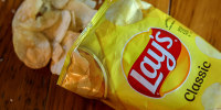 A bag of Lay's Classic potato chips.