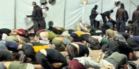 A video posted by Israeli security minister Itamar Ben-Gvir shows a group of Gaza activists with their hands tied behind their backs, kneeling with their heads touching the floor, in what appears to be a makeshift detention area at Ashdod port and on the deck of a ship.