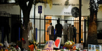 People take part in an early morning call to prayer at the Islamic Center of San Diego