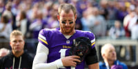 MINNEAPOLIS, MINNESOTA - OCTOBER 19: Carson Wentz #11 of the Minnesota Vikings stands on the sidelines during the national anthem prior to an NFL football game against the Philadelphia Eagles at U.S. Bank Stadium on October 19, 2025 in Minneapolis, Minnesota. (Photo by Kevin Sabitus/Getty Images)