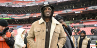 CLEVELAND, OHIO - DECEMBER 07: NFL Deion Sanders waits to greet his son Shedeur Sanders #12 of the Cleveland Browns prior to a game against the Tennessee Titans at Huntington Bank Field on December 07, 2025 in Cleveland, Ohio. (Photo by Jason Miller/Getty Images)