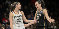Apr 25, 2026; Brooklyn, NY, USA; Indiana Fever guard Caitlin Clark (22) and New York Liberty forward Breanna Stewart (30) interact during the first half at Barclays Center. Mandatory Credit: John Jones-Imagn Images